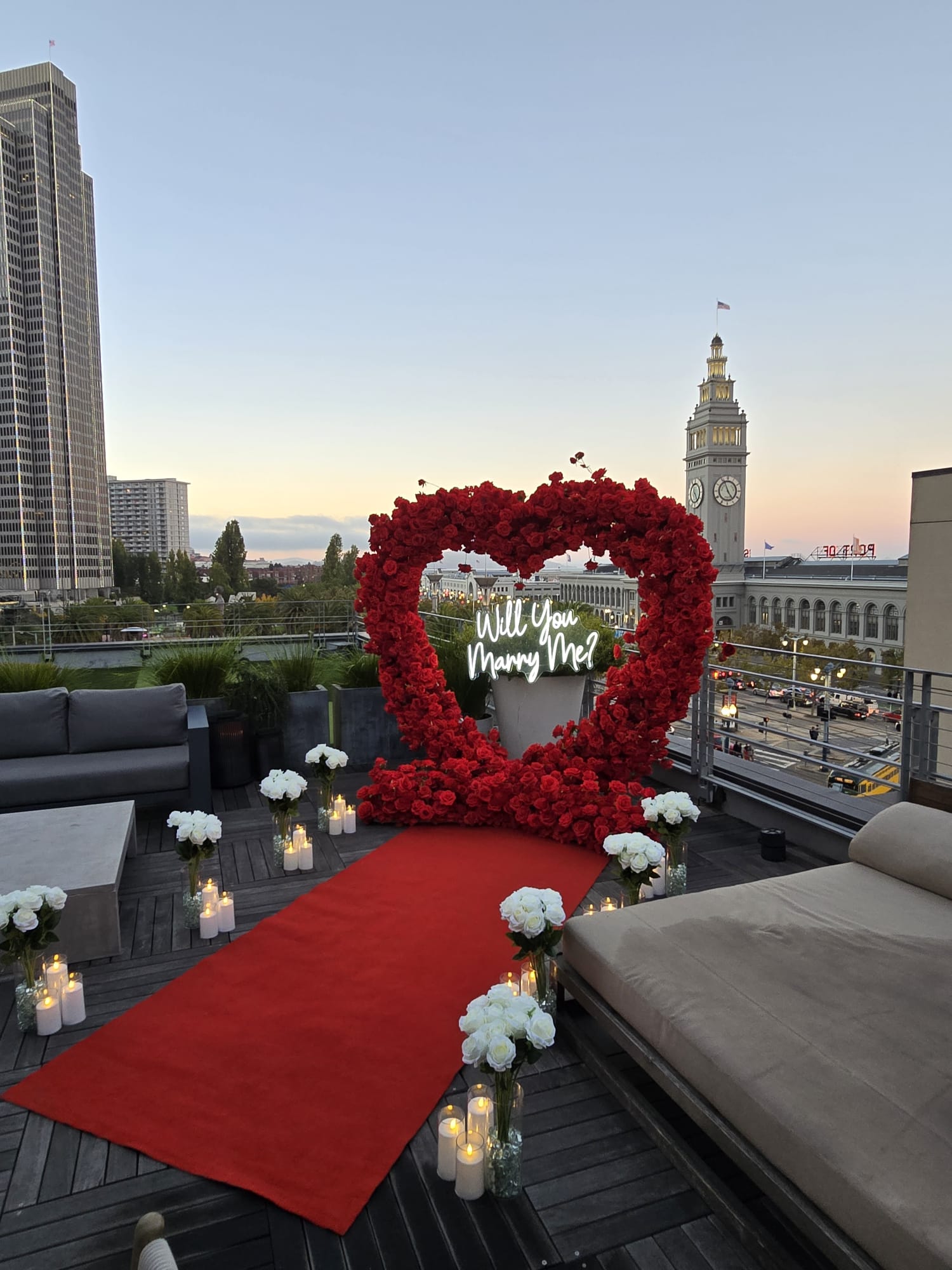 Romantic marriage proposal setup at Baker Beach in San Francisco Bay Area