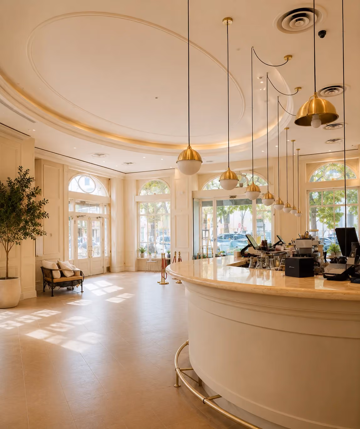 Elegant curved marble bar and arched windows onto Chestnut Street inside ERIA Marina in San Francisco's Marina District