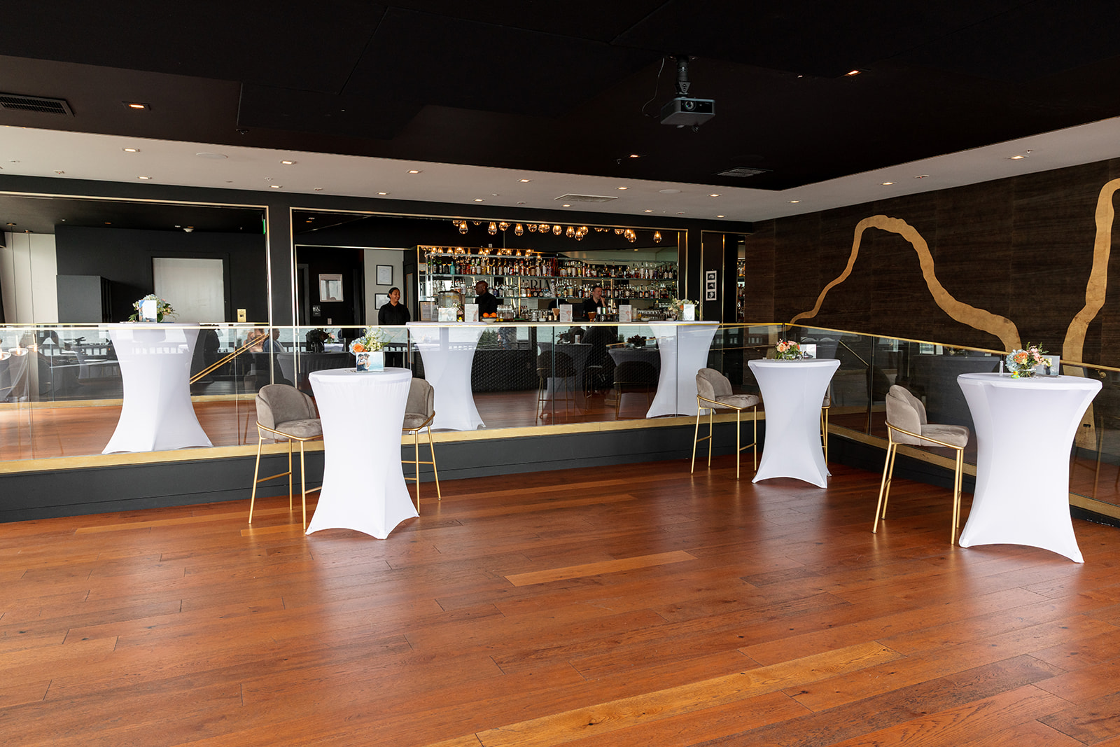 Candlelit rooftop reception at ERIA Sausalito with waterfront Marin County backdrop