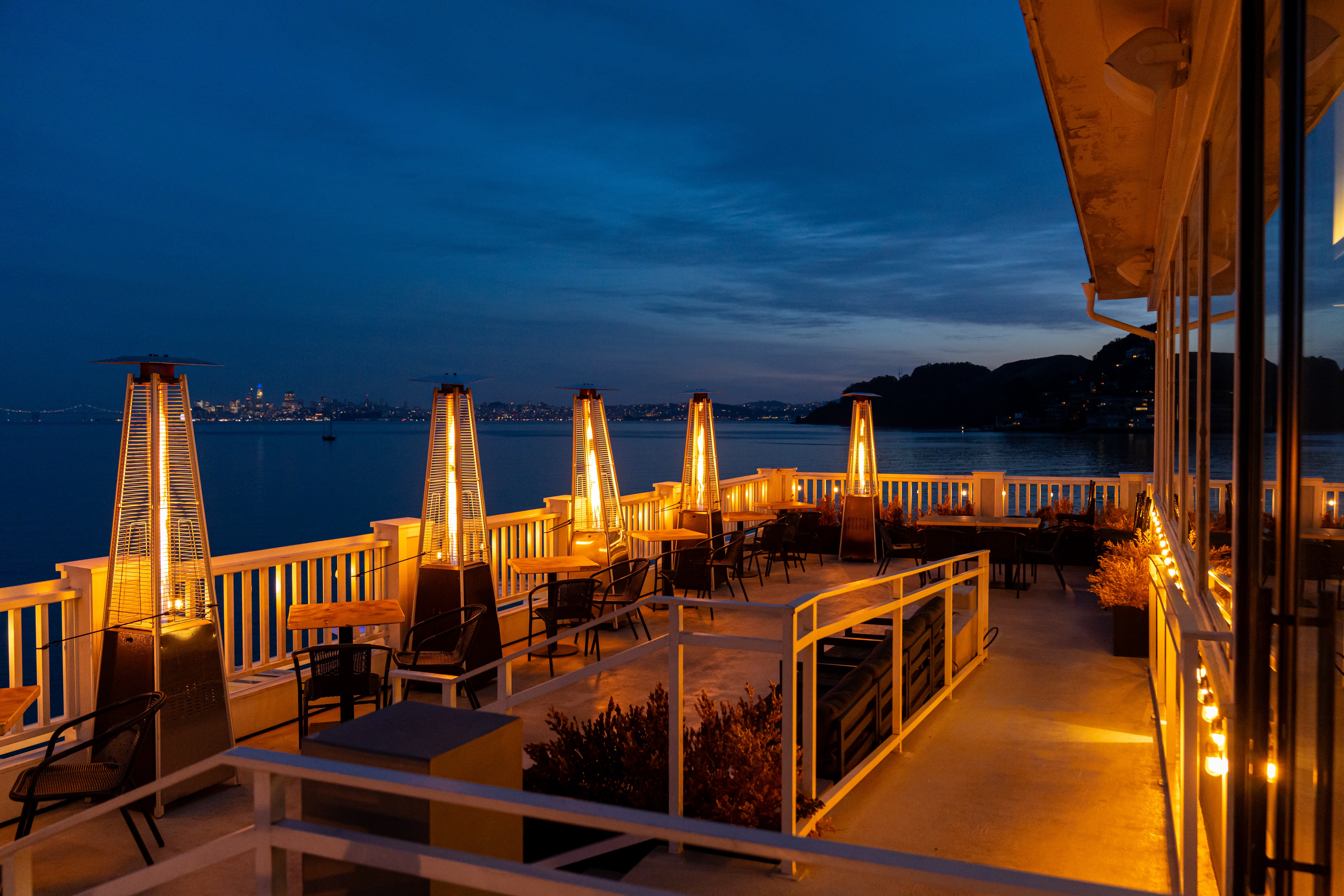 Elegant table setting at ERIA Sausalito with waterfront views