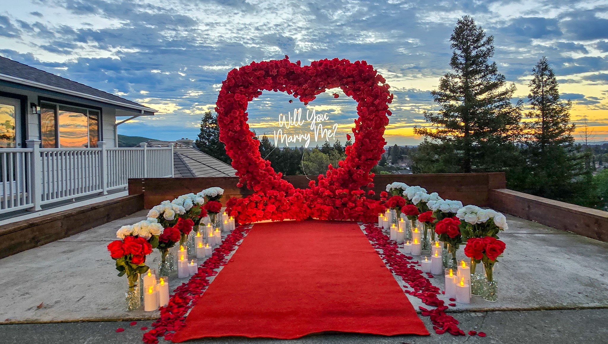 Bay Area Proposal with 20 dozen roses, 30 candles, and a red rose heart arch